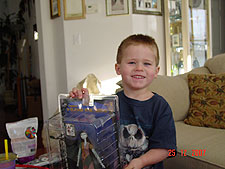 Hunter showing his presents
