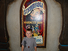 Hunter waiting in line for the Pinnochio ride