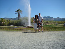 All of us in front of Old Faithful.