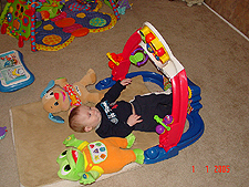 Hunter playing with the Kick n' Whirl.