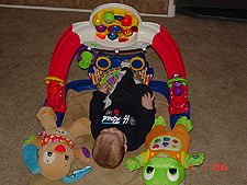 Hunter loves to kick to make the wheel spin and the lights flash...