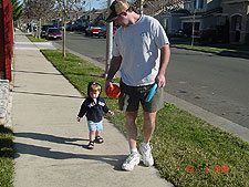 Hunter and Daddy walking to the park.