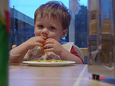 Hunter eating spaghetti dinner.