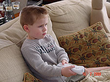 Hunter playing his Wii.