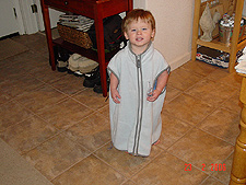 Hunter wearing mommy's vest.
