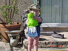 Hunter with his frog watering can.