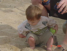 Hunter loves the sand.