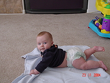 Hunter playing on his belly.
