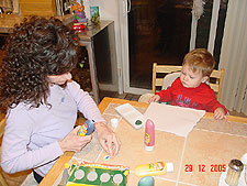 Mommy & Hunter get ready for finger painting.