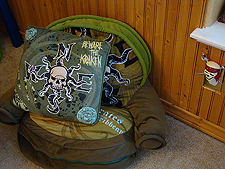 chair with fold-out sleeping bag & pillow