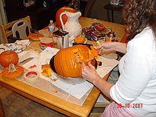 Heidi carving pumpkins