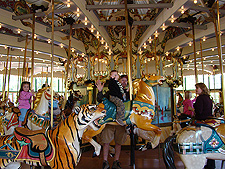 Dave and Hunter on the carousel