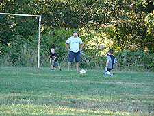 Hunter practicing goal kicks.