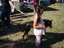Olivia with one of the dogs from the Ugly Dog Contest.