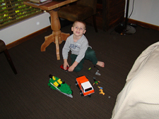 Hunter playing with his toys from Caela's.