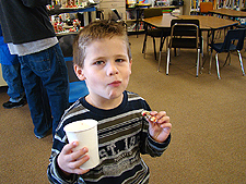 Hunter having some hot cocoa and cookies