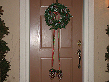 wreath & pine codes on door