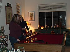 Alysia and Jeannie play pool.