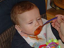 Eating sweet potatos.