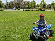 Hunter riding his ATV.