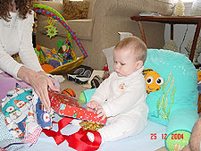 Opening another box.